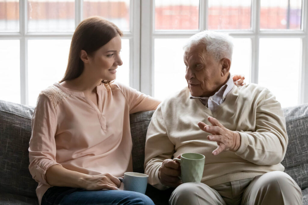 Talk,During,Teatime,With,Aged,Man,,Caregiver,Listens,Life,Memories